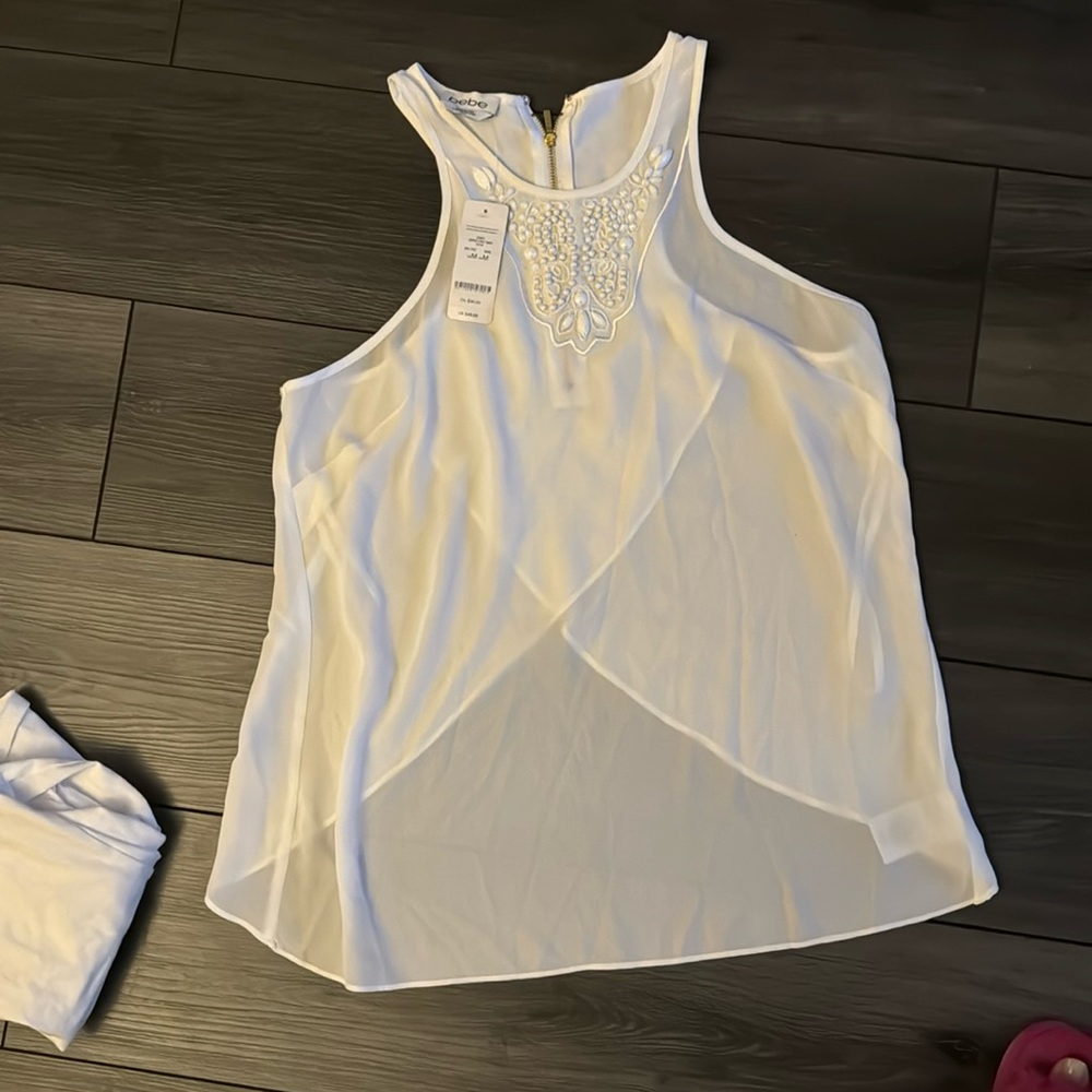 Bebe sleeveless top with tulip back